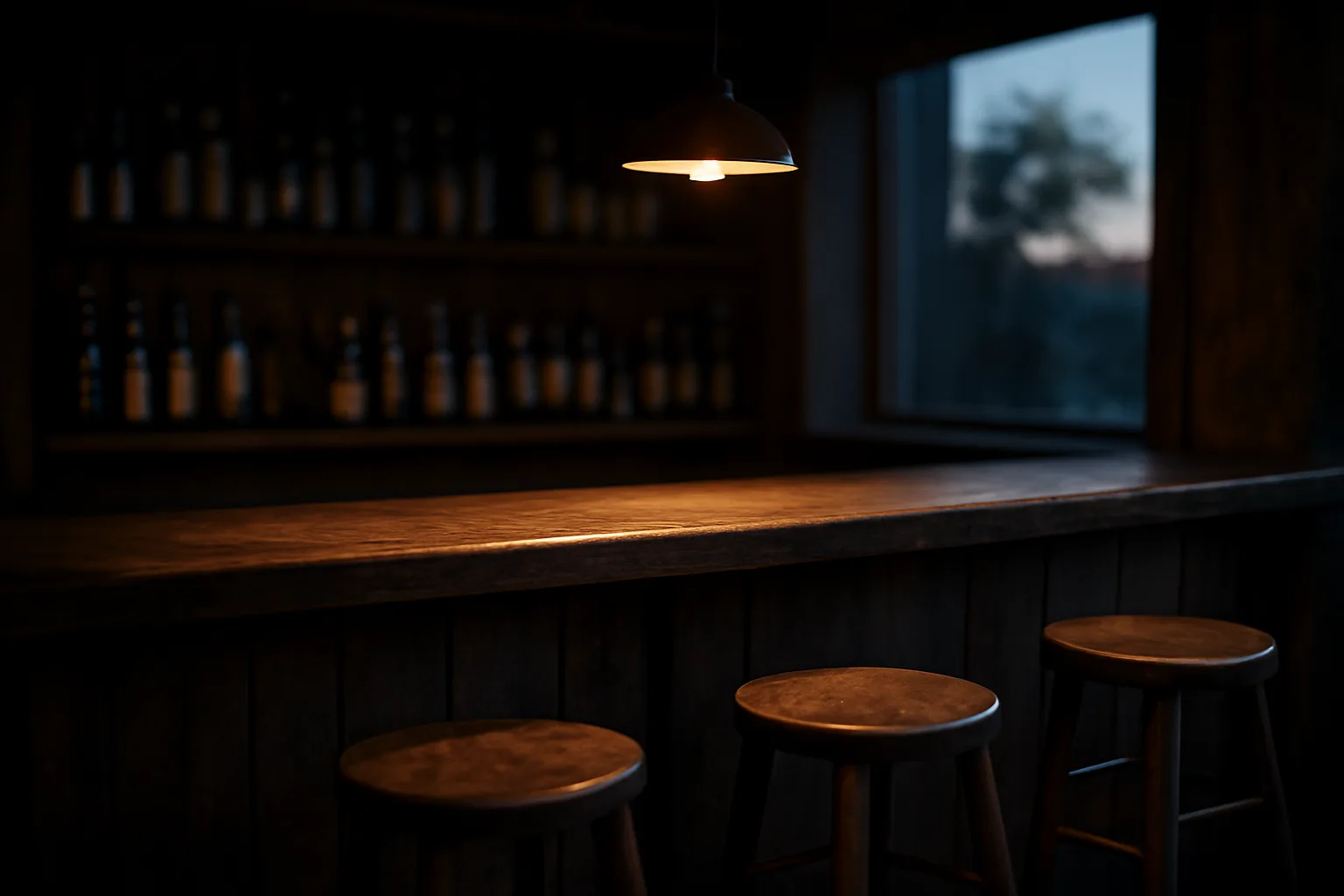 Empty bar counter with warm lighting, symbolizing a business waiting on liquor license approval